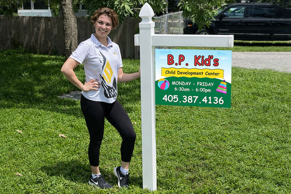 18x24 aluminum signs mounted with yard arm for long-term outdoor use