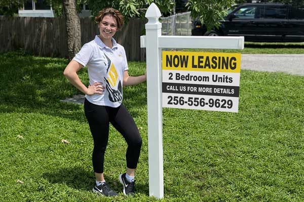 18x24 aluminum for rent signs mounted with yard arm for long-term outdoor use