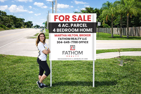 4x4 Fathom Realty sign with metal post kit installed
