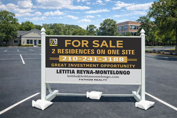 4x8 Fathom Realty sign installed outdoors