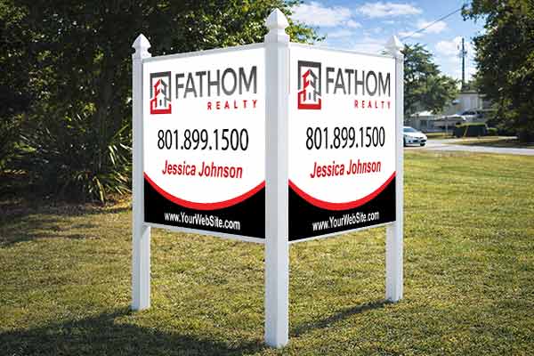 4x4 Fathom Realty sign mounted with Arrow post kit