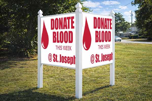 4x4 fundraising sign mounted outdoors