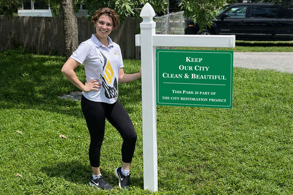 18x24 aluminum signs mounted with yard arm for long-term outdoor use