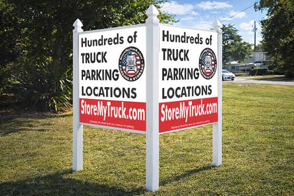 4x4 auction sign with arrow post kit installed outdoors