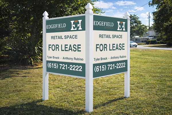 4x4 real estate sign mounted with Arrow Post Kit for two-panel V-shaped display