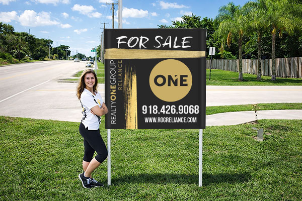 4x4 Realty ONE Group sign with metal post kit installed outdoors